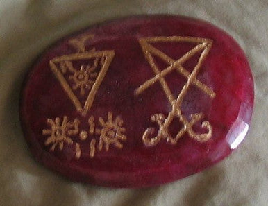 1/2" or larger ruby cabochon set in a pendant any listed seal on it
